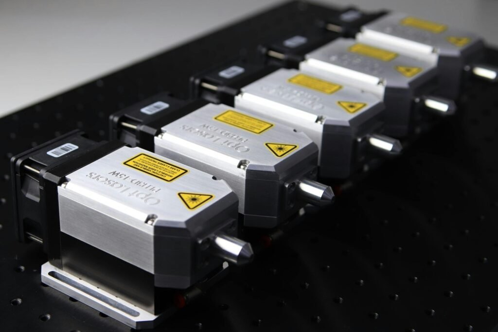 Close-up of aligned CNC laser modules, ideal for precision cutting and engraving.
